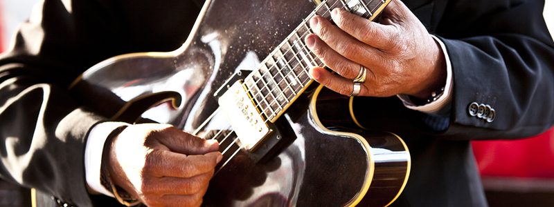 Musician holding guitar