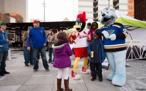 Fredbird and Louie mascots at Kiener Plaza.