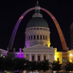Gateway Arch lit up Purple
