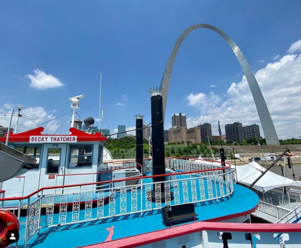 The upper deck of the Becky Thatcher with the Arch in the background