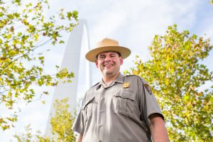 National Park Service Ranger in front of Arch