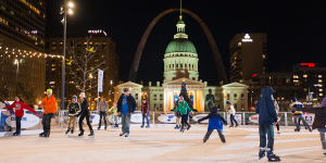 group of people ice skating in Kiener Plaza in downtown St. Louis.