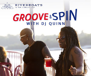 Two Black women dancing on the Riverboats during a Goove & Spin cruise