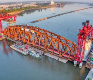 Truss piece of the Merchant's Bridge being ready to be placed in Downtown St. Louis