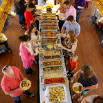 Overhead shot of a long buffet table aboard the Brunch Cruise at the Riverboats at the Gateway Arch.