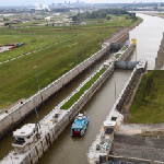 Aerial view of a Riverboat at the Gateway Arch entering the lock system on a Lock-N-Dam Cruise with a view of downtown St. Louis in the background.