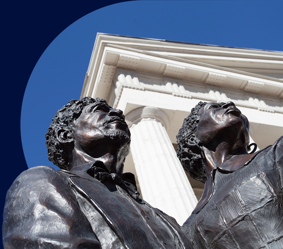 Closeup of statute of Dred and Harriet Scott outside the Old Courthouse