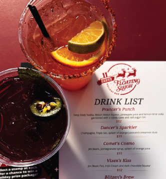 Two cocktails and the drink menu for The Floating Sleigh.